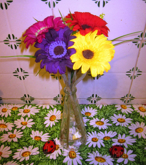 Радужный букет из одинаковых цветов