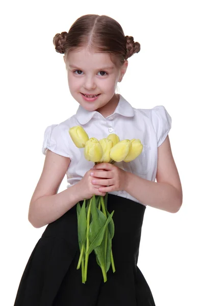 Смазливая школьница с букет тюльпанов — стоковое фото
