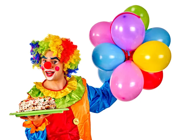 С днем рождения клоуна, держа кучу шаров — стоковое фото